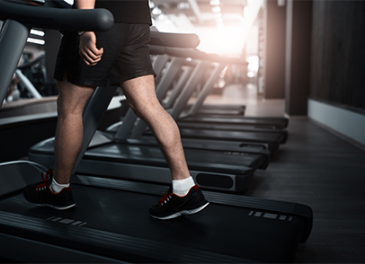 Feet running on a treadmill